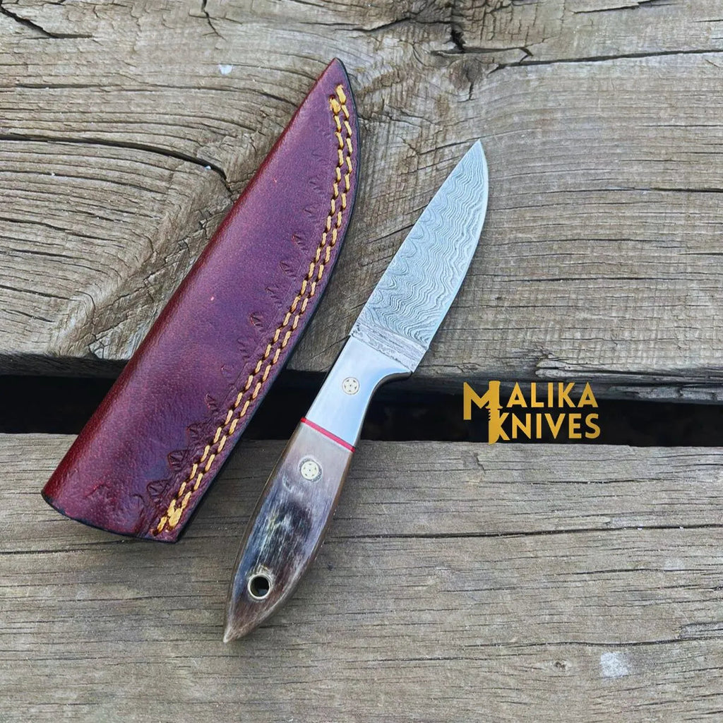 Damascus Steel Skinner Knife - Unmatched Precision with Genuine Ram Horn Handle for Outdoor Enthusiasts - RFE Marketing Ventures