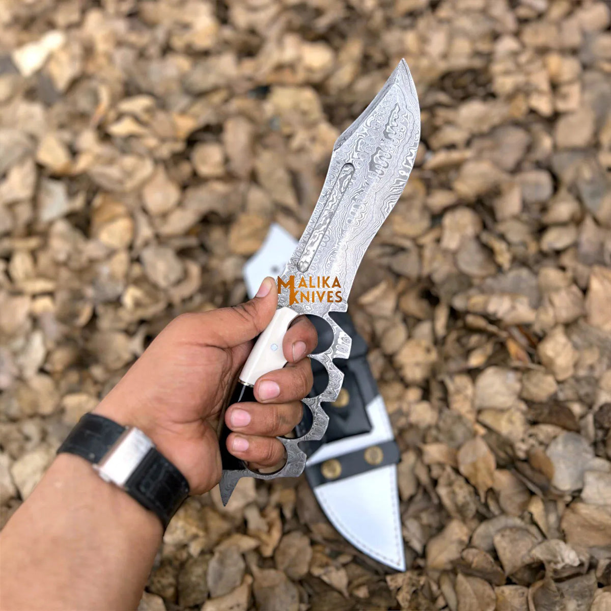 Experience Precision and Style with the Damascus Knuckle Bowie Knife - RFE Marketing Ventures