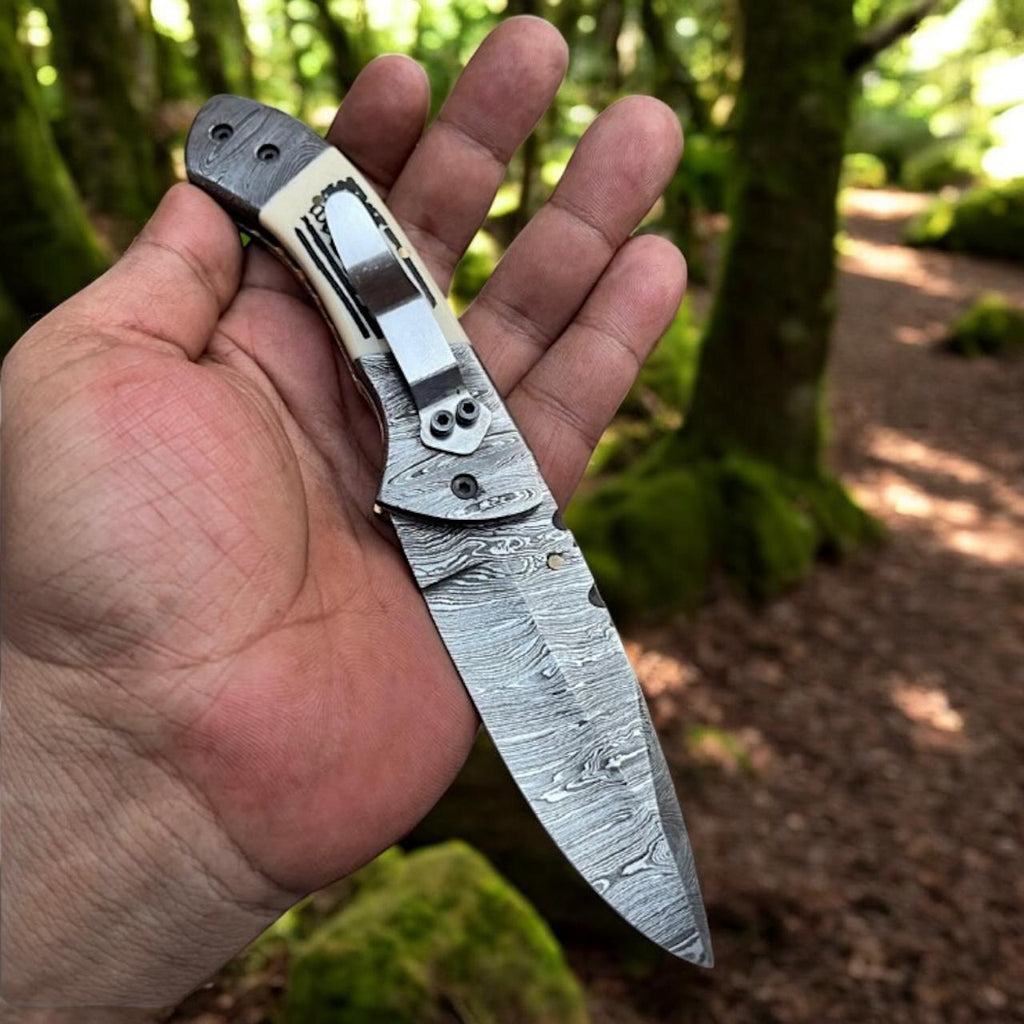 Experience Freedom with the Patriotic Damascus Folding Knife – Camel Bone Handle Edition - RFE Marketing Ventures