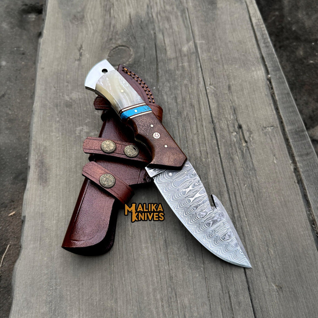 Discover the Ultimate Damascus Gut Hook Hunting Knife for Precision Processing - RFE Marketing Ventures