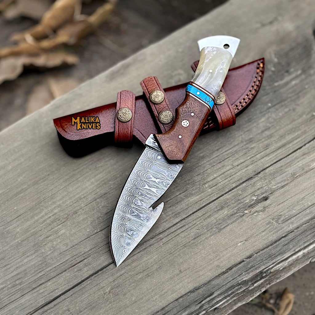 Discover the Ultimate Damascus Gut Hook Hunting Knife for Precision Processing - RFE Marketing Ventures