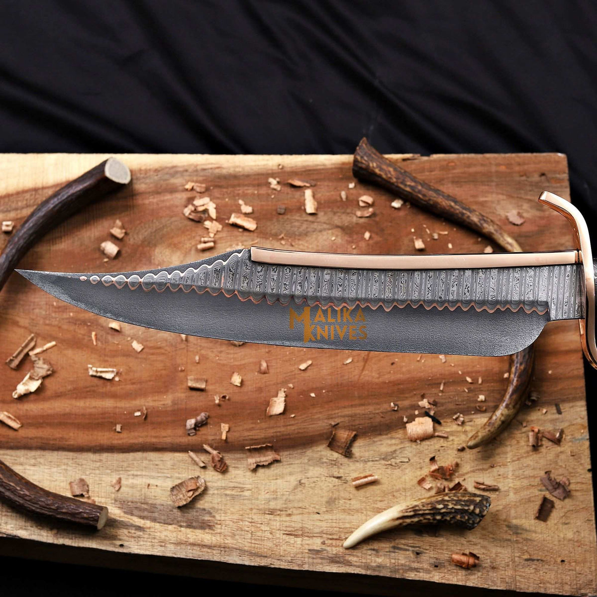 Experience the Craftsmanship of the Copper Damascus Alamo Musso Bowie Knife - RFE Marketing Ventures