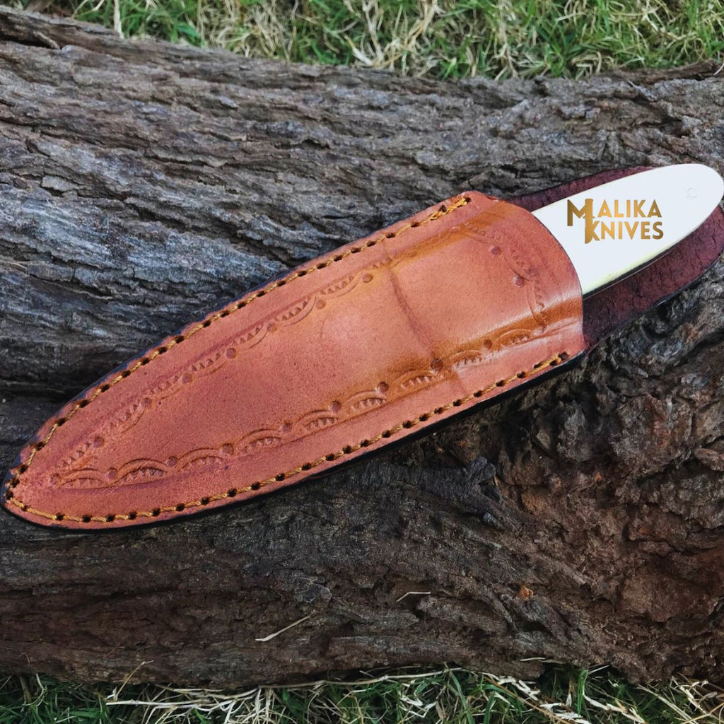 Precision D2 Steel Hunting Knife with Camel Bone Handle for Ultimate Control - RFE Marketing Ventures